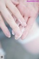 A close up of a person's hands with soap on them.